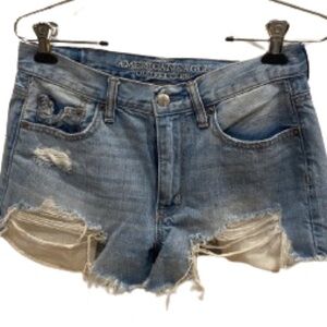 AMERICAN EAGLE OUTFITTERS, Size 4, faded and distressed  short Jean  shorts.
